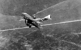 Archival photo of a biplane reconnaissance aircraft